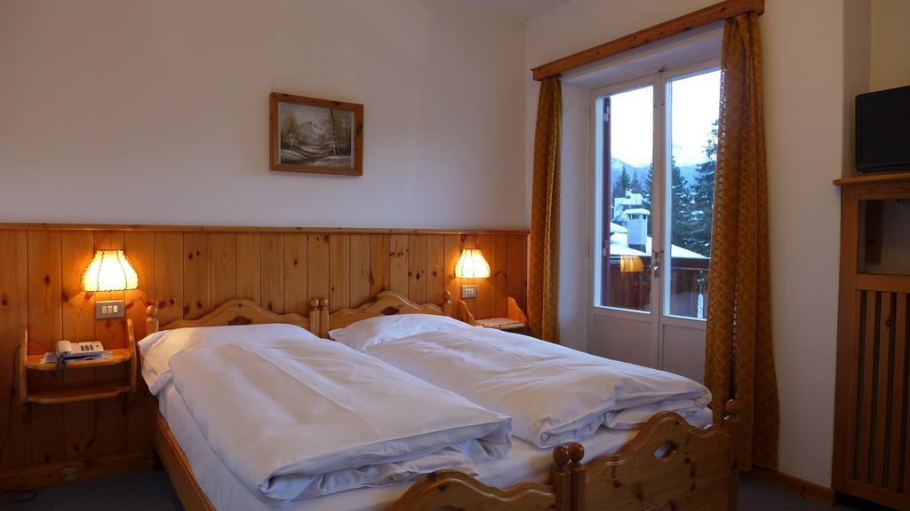 Hotel Bellaria - Кортина-д'Ампеццо Номер фото